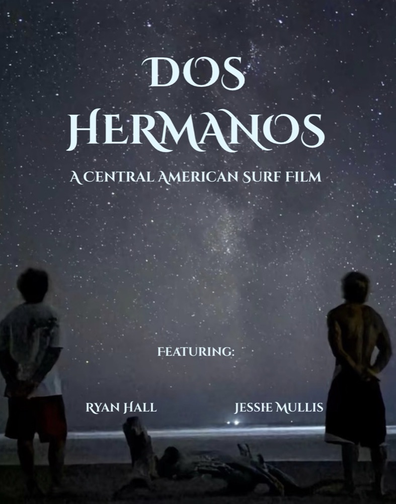 Dos Hermanos poster: two surfers stand on a beach under the Milky Way.
